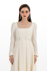 فستان ماكسي أنيق بأكمام طويلة وطيات مزينة