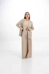 بنطال واسع بخصر عالٍ وطيات أمامية