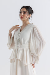 Crystal-Embellished Peplum Gown with Draped Sleeves